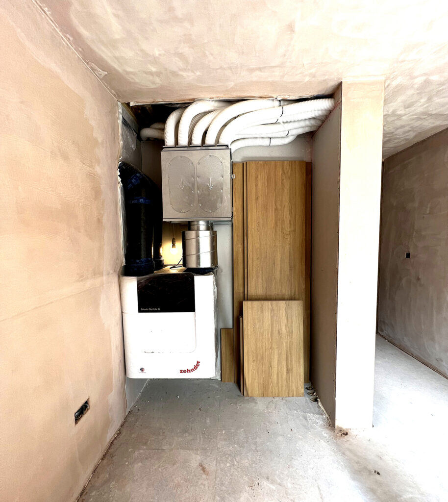 The MVHR unit is positioned in the Guest Bedroom wardrobe