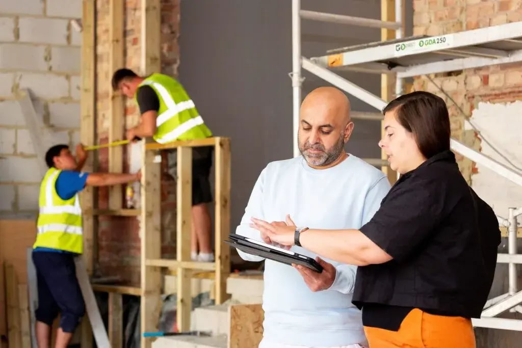 Site meeting during construction at Herbert Paradise rear and dormer extension project in Kensal Rise, NW London designed by architects RISE Design Studio