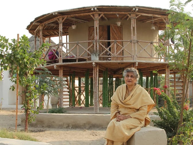 RISE_Design_Studio-Yasmeen_Lari-in_front_of_building