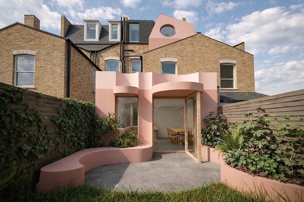 Sculpted pink render rear extension to Victorian terrace in Stoke Newington, with cylindrical forms, circular oculus and curved garden bench, designed by RISE Design Studio
