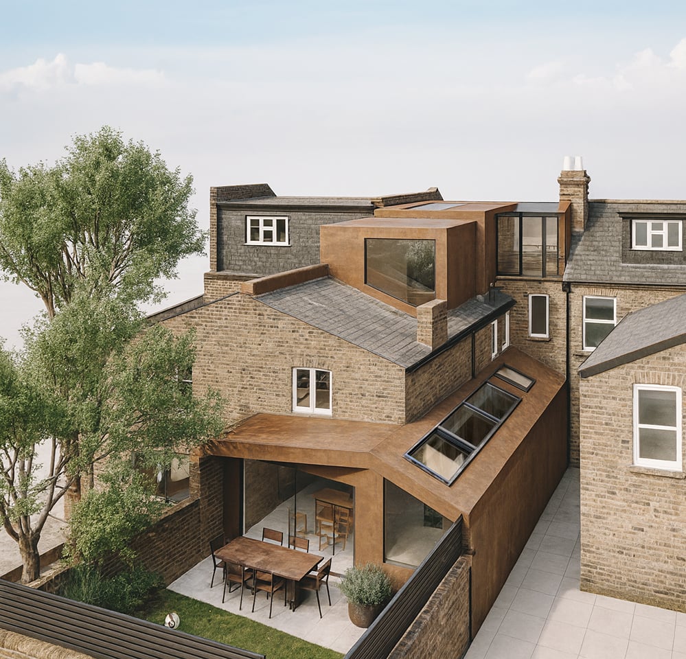 Aerial view of Corten House in Kensal Rise showing the AECB standard low energy retrofit, with Corten-clad extension, dormer structure, roof glazing and brick terraces surrounding a transformed family home.