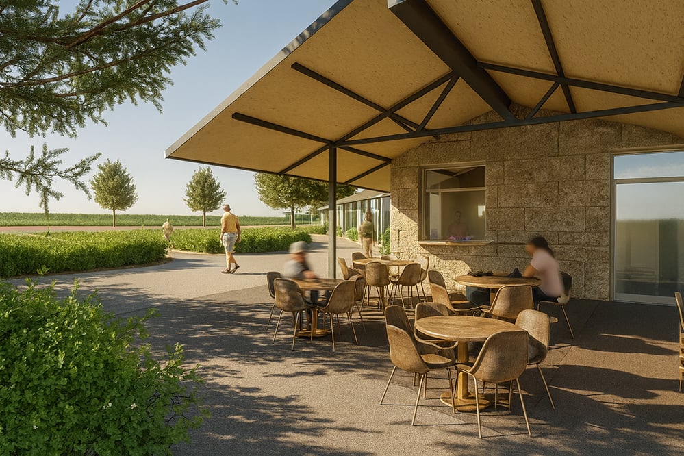 New sustainable tennis clubhouse terrace with hempcrete walls, canopy structure and soft evening light. Families sit at round tables with views toward the courts and landscape.