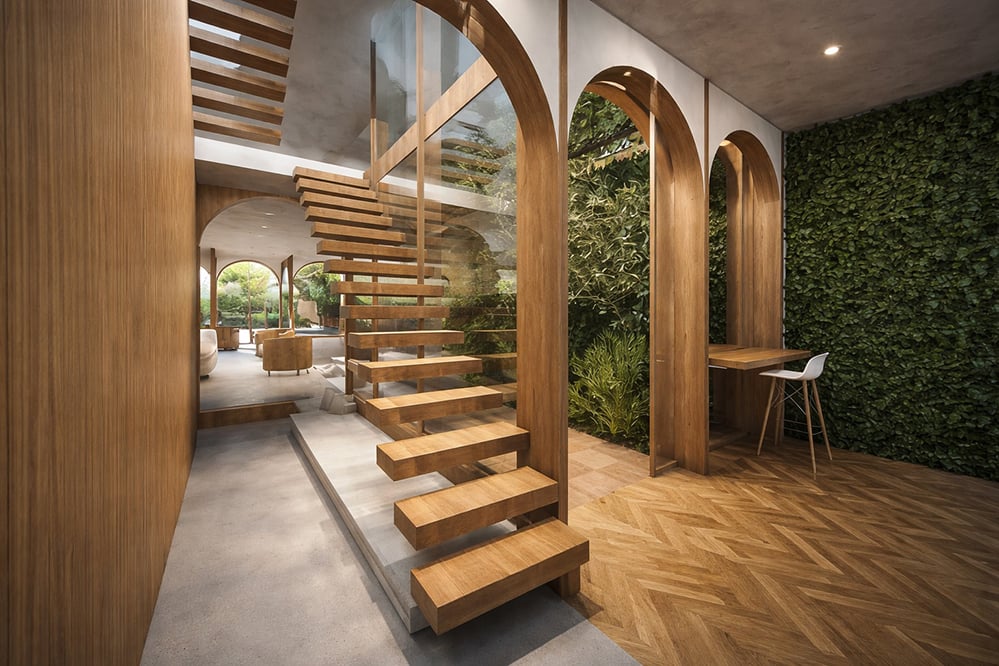 Floating timber staircase beside garden in a London home extension, with large glazing and natural planting, blending indoor and outdoor spaces in a low-energy residential architecture project.