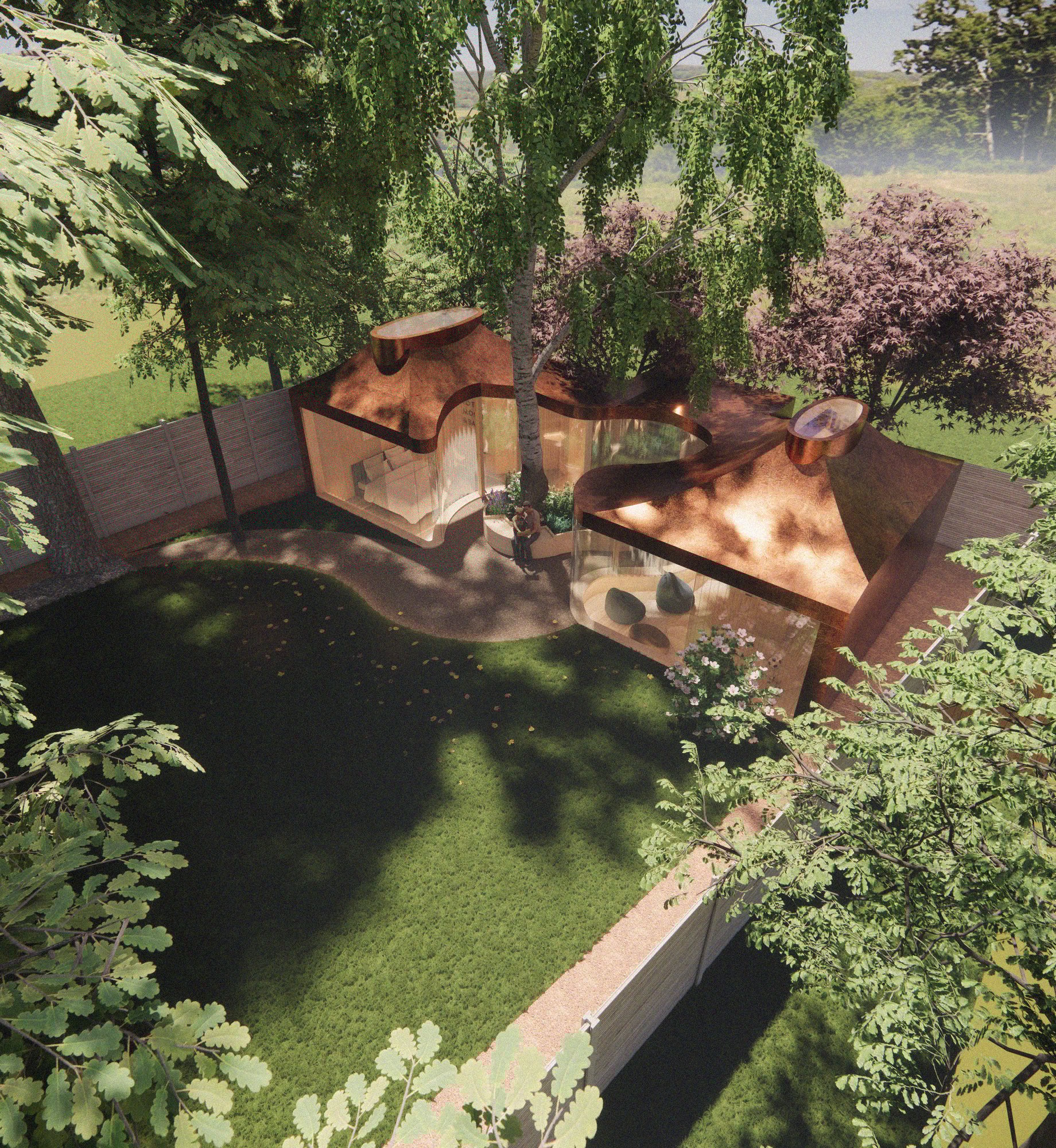 Aerial view of a sculptural garden studio in Hampstead designed by RISE Design Studio, featuring curved copper roofs, large glass walls, and two oval rooflights, nestled among mature trees and blending harmoniously with the natural landscape