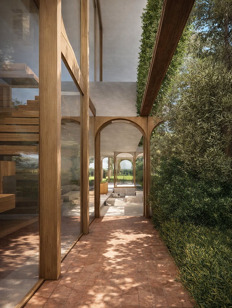 Floating timber staircase within an arched interior space in a London home, combining natural materials, soft lighting and greenery to create a calm, biophilic residential environment.