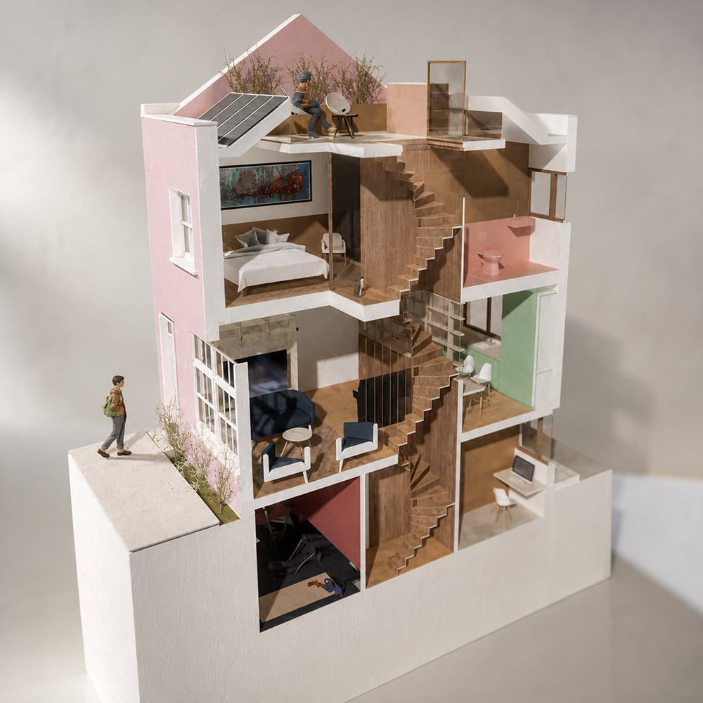 Architectural sectional model of a contemporary Paddington townhouse retrofit showing open-plan interiors, rooftop terrace, solar panels, natural materials, and vertical circulation designed by RISE Design Studio.