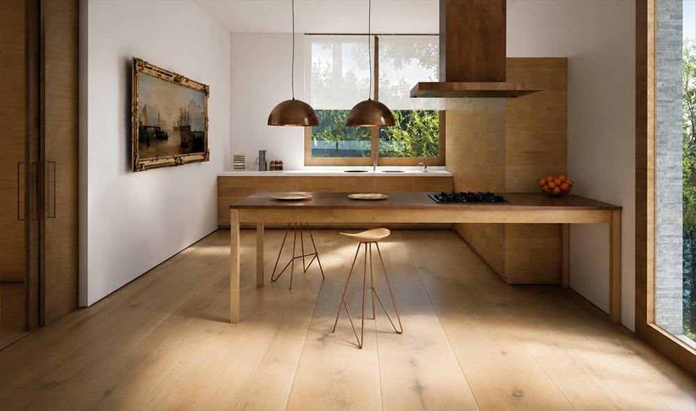 Sustainable new-build farmhouse kitchen with island and wide dinesen oak floorboards and copper light shades