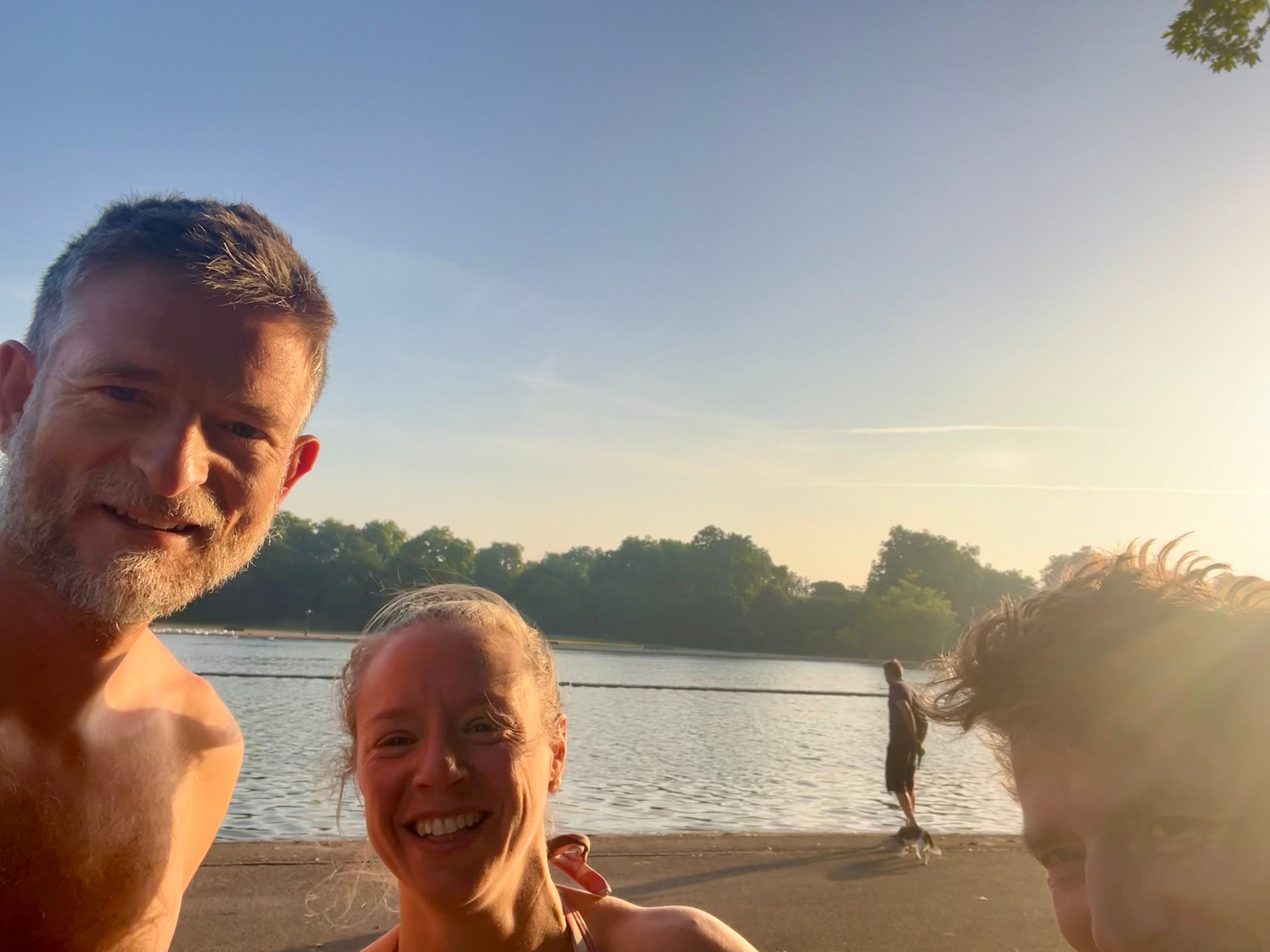 Architect Sean Hill and client Zoe Birch of Physio Motion Mayfair at the Serpentine Lake, Hyde Park, London, after an early morning open water swim during the May 2026 heatwave.