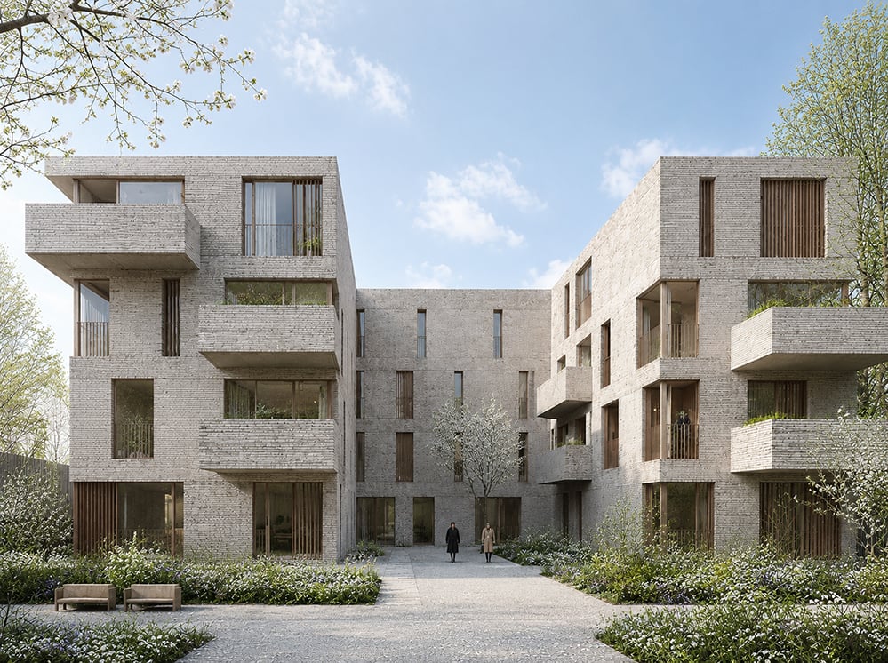 Sustainable courtyard housing development in pale brick with timber louvred balconies, planted communal garden, stone path and flowering trees. Low-carbon residential architecture demonstrating design-led public housing.