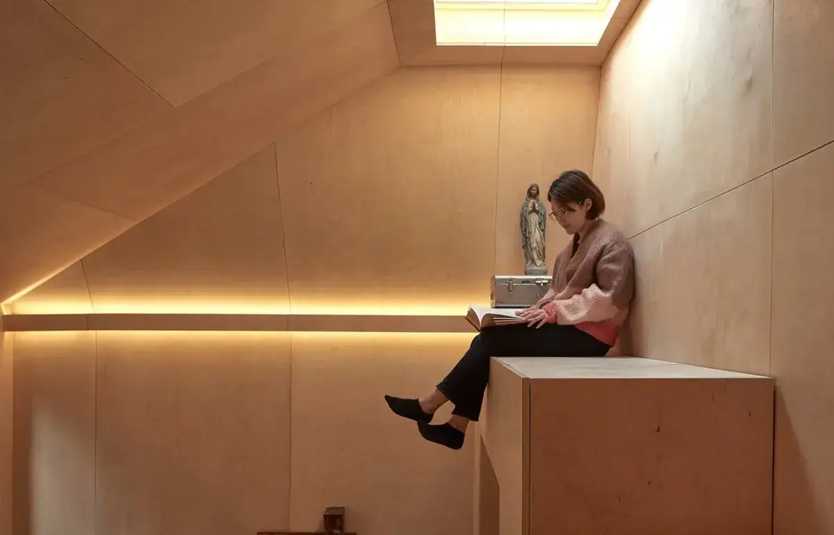 Timber chapel interior designed with natural materials by RISE Design Studio architects