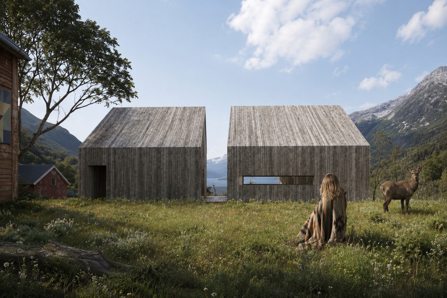 Render of two single-storey gabled cabins clad in weathered grey timber standing in a meadow, a gap between them framing a lake and mountains, red farm buildings to the left, a seated figure in a blanket and a deer in the foreground. RISE Design Studio.
