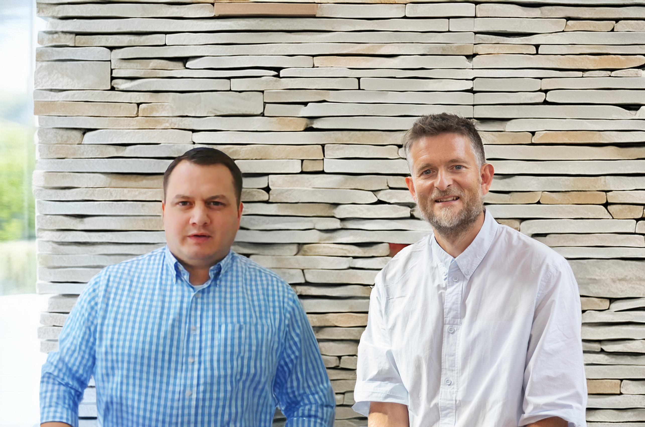 Sean Ronnie Hill and Edward Smith of Artorius Faber in front of a stacked natural stone wall, discussing the sustainable use of UK-sourced stone in low-carbon architecture.