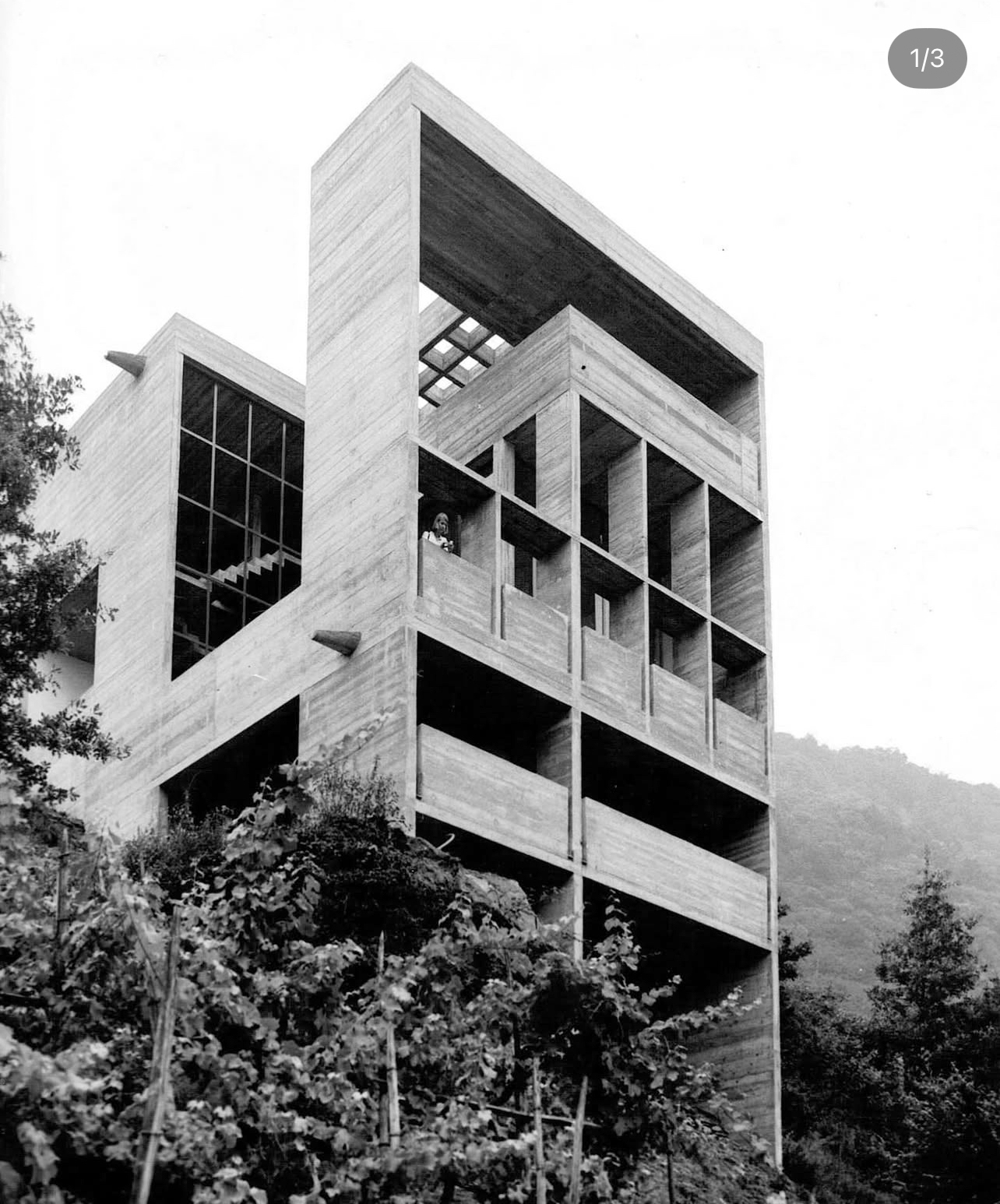 A minimalist, multi-storey concrete home set into a Swiss hillside, Casa Viggiano showcases raw materiality and geometric precision in harmony with nature.